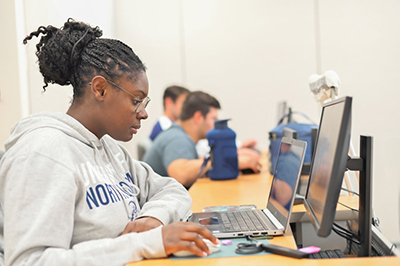 student on her laptop
